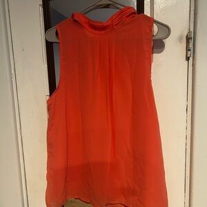 Vibrant Orange Sleeveless Blouse with Flowing Silhouette